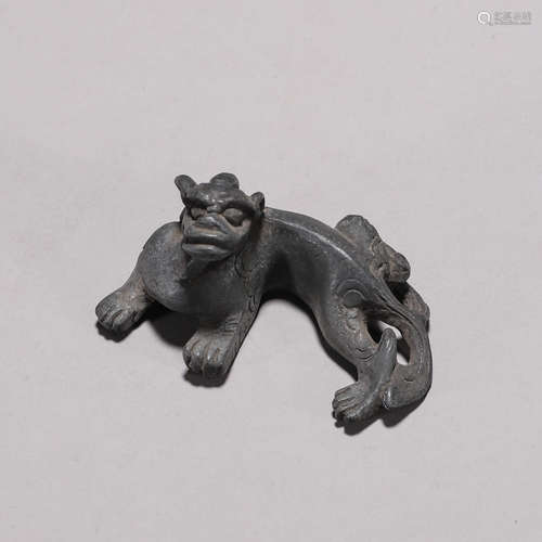 A stone carved chi dragon ornament