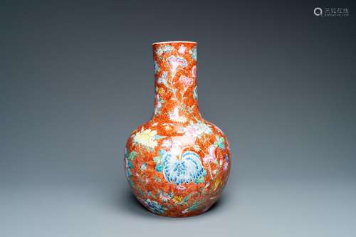 A CHINESE FAMILLE ROSE MILLEFLEURS BOTTLE VASE, QIANLONG MAR...