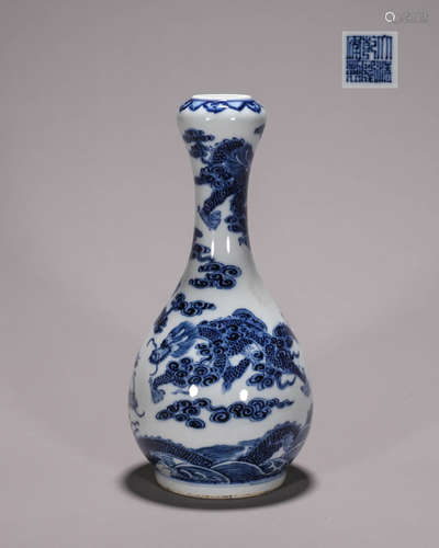 A blue and white cloud and dragon porcelain vase