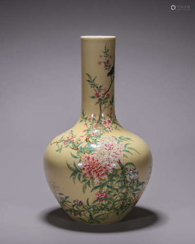 A yellow glazed famille rose flower porcelain tianqiuping