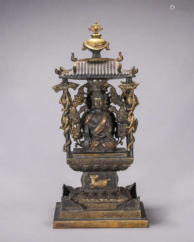 A gilding silver buddha statue