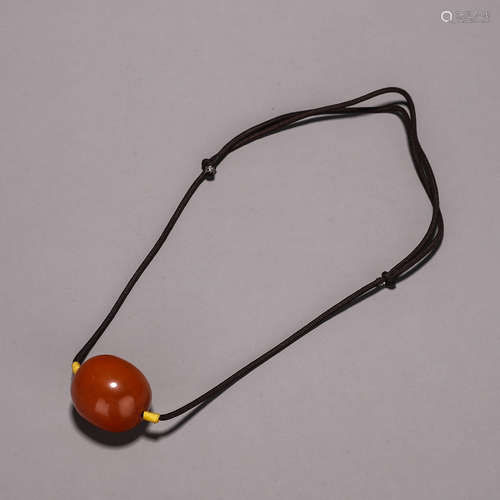 An amber bead ornament