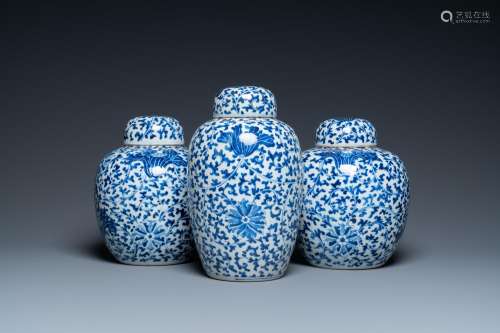 THREE CHINESE BLUE AND WHITE JARS AND COVERS WITH FLORAL SCR...