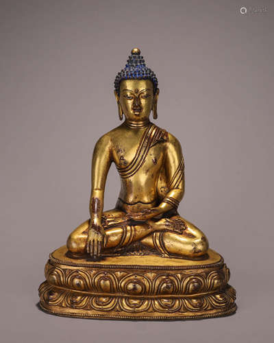 A copper Sakyamuni buddha statue