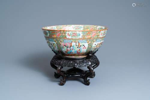 A LARGE CHINESE CANTON FAMILLE ROSE BOWL ON WOODEN STAND, 19...