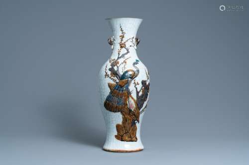 A CHINESE POLYCHROME NANKING CRACKLE-GLAZED 'PEACOCK&#x...