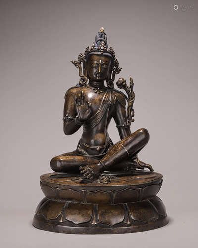 A copper silver-inlaid Guanyin bodhisattva statue