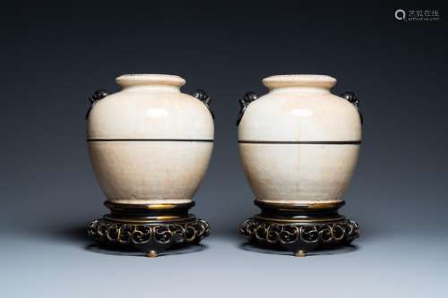 A PAIR OF CHINESE MONOCHROME NANKING CRACKLE-GLAZED VASES ON...