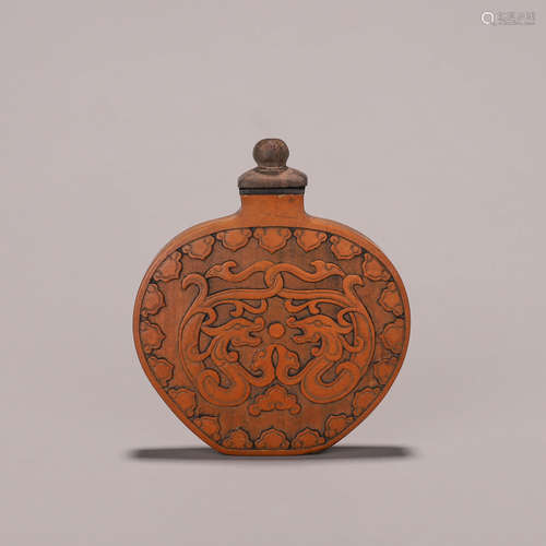 A dragon patterned bamboo snuff bottle