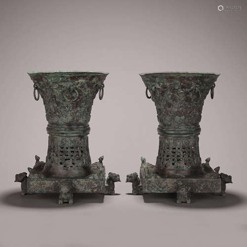 A pair of kui dragon patterned bronze zun