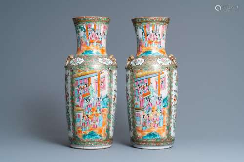 A PAIR OF CHINESE CANTON FAMILLE ROSE VASES, 19TH C.
