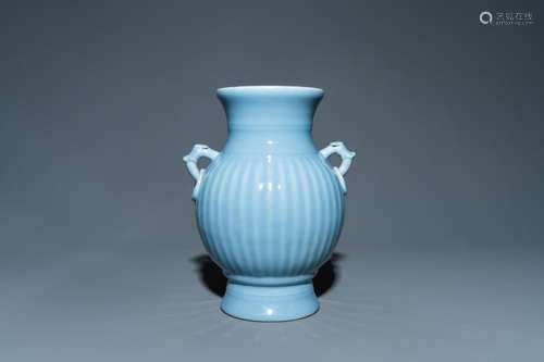 A CHINESE MONOCHROME LAVENDER-BLUE VASE, QIANLONG MARK, REPU...