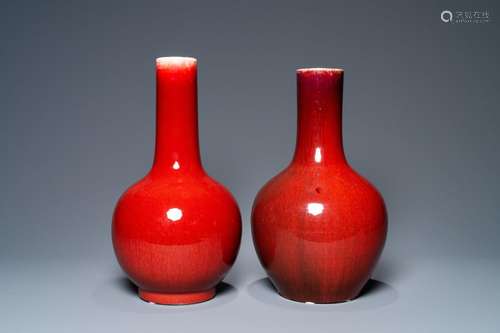 TWO CHINESE MONOCHROME SANG DE BOEUF BOTTLE VASES, 19/20TH C...