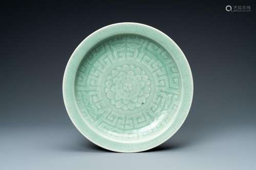 A CHINESE MONOCHROME CELADON 'LOTUS' DISH, QIANLON...