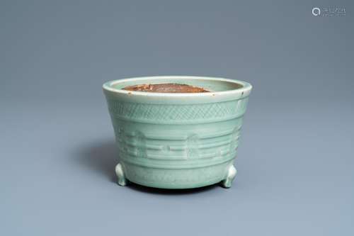 A CHINESE LONGQUAN CELADON TRIPOD CENSER, MING