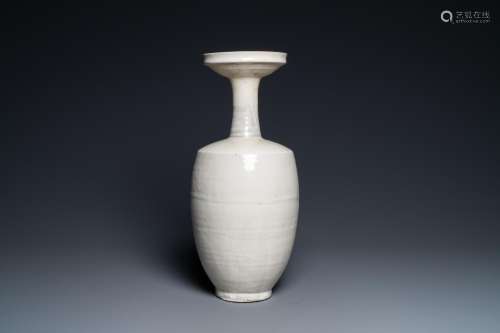 A CHINESE CREAM-GLAZED CIZHOU-TYPE VASE, LIAO OR LATER