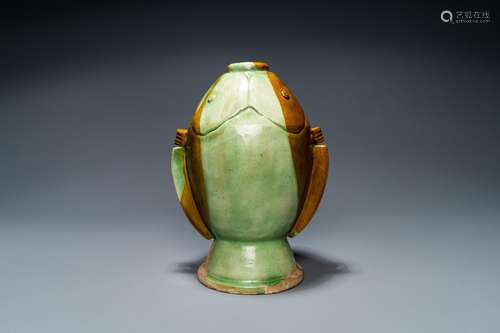 A CHINESE SANCAI-GLAZED 'TWIN FISH' VASE, PROBABLY...