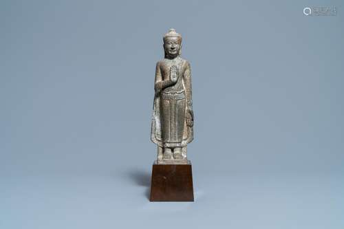 A KHMER SANDSTONE FIGURE OF BUDDHA, THAILAND, LOPBURI PERIOD...