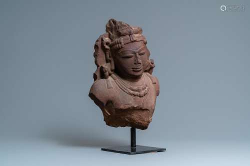 A FINE RED SANDSTONE BUST OF A CELESTIAL NYMPH, CENTRAL INDI...