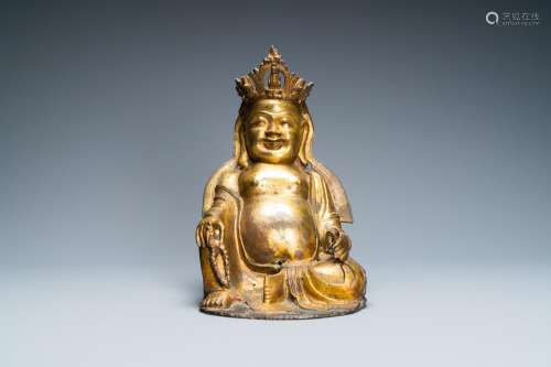 A CHINESE GILT BRONZE FIGURE OF THE SEATED BUDDHA, MING