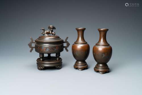 A CHINESE INLAID BRONZE CENSER AND A PAIR OF VASES FOR THE V...