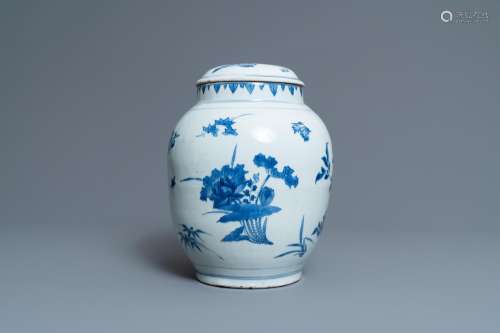 A CHINESE BLUE AND WHITE VASE AND COVER WITH FLORAL SPRIGS, ...