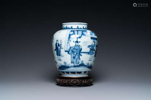 A CHINESE BLUE AND WHITE VASE WITH NARRATIVE DESIGN ON WOODE...
