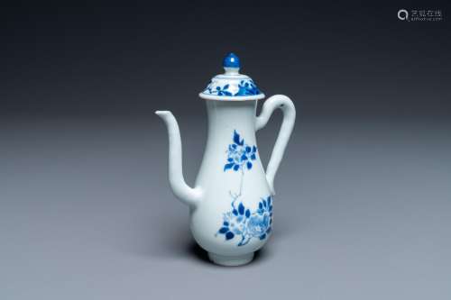 A CHINESE BLUE AND WHITE EWER WITH FLORAL DESIGN, TRANSITION...