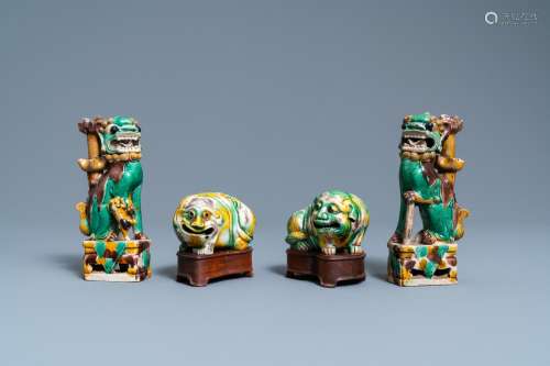A PAIR OF CHINESE SANCAI MODELS OF DOGS AND A PAIR OF '...