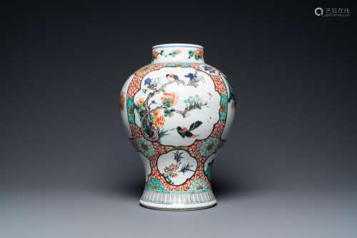 A CHINESE FAMILLE VERTE VASE WITH BIRDS NEAR FLOWERY BRANCHE...