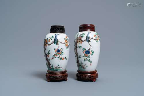 A PAIR OF CHINESE FAMILLE VERTE JARS WITH BIRDS AMONG BLOSSO...