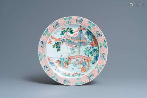 A CHINESE FAMILLE VERTE DISH WITH FIGURES IN A LANDSCAPE, KA...