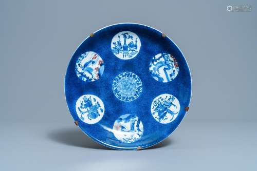 A CHINESE BLUE, WHITE AND COPPER-RED POWDER-BLUE-GROUND DISH...