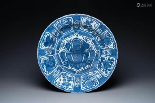 A LARGE CHINESE BLUE AND WHITE KRAAK PORCELAIN DISH WITH A J...
