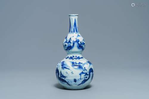 A CHINESE BLUE AND WHITE DOUBLE GOURD VASE, WANLI