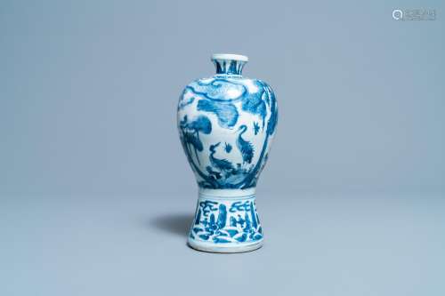 A CHINESE BLUE AND WHITE 'MEIPING' VASE WITH CRANE...