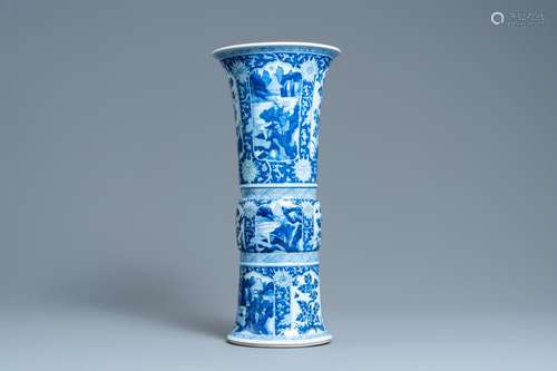 A CHINESE BLUE AND WHITE 'GU' VASE WITH FLORAL AND...