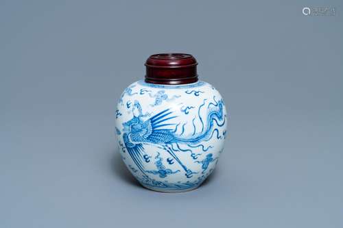 A CHINESE BLUE AND WHITE 'DRAGON AND PHOENIX' JAR ...