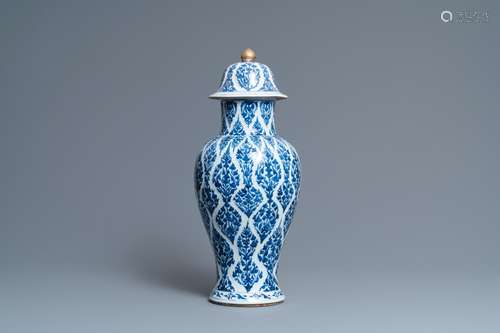 A CHINESE BLUE AND WHITE VASE AND COVER, KANGXI