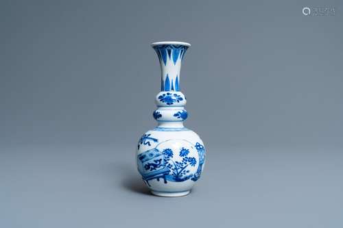 A CHINESE BLUE AND WHITE TRIPLE GOURD 'ANTIQUITIES'...