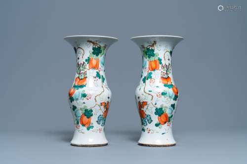 Lot 584: A PAIR OF CHINESE FAMILLE ROSE VASES WITH BOYS HANG...