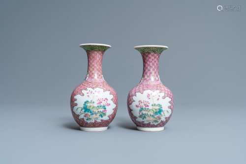 Lot 630: A PAIR OF CHINESE FAMILLE ROSE BOTTLE VASES WITH FL...