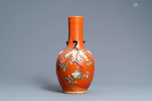 SANDUO' VASE WITH APPLIED DESIGN ON A CORAL RED GROUND,...