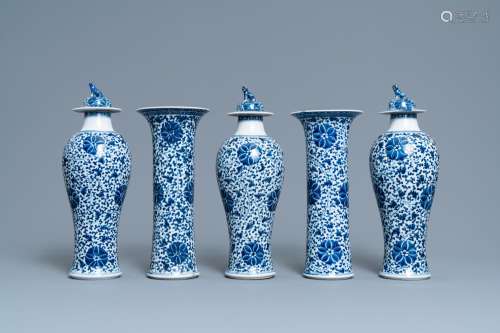 Lot 660: A CHINESE BLUE AND WHITE FIVE-PIECE GARNITURE WITH ...