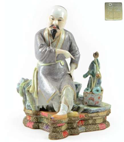 Famille Rose Porcelain Figure of a Scholar With Seal