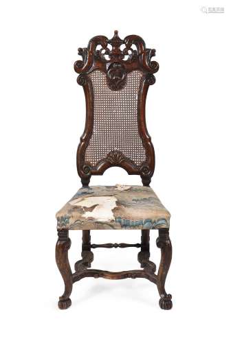 A WILLIAM & MARY CARVED WALNUT SIDE CHAIR IN THE MANNER ...