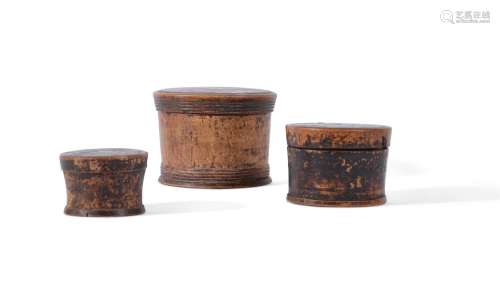 A SET OF THREE TREEN CIRCULAR LIDDED CONTAINERS, 18TH/19TH C...