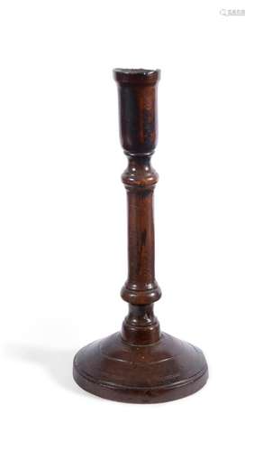 A RARE TREEN TURNED FRUITWOOD CANDLESTICK, 18TH CENTURY AND ...