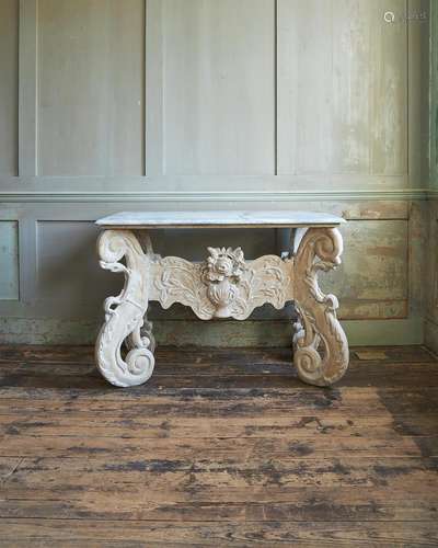 A DUTCH CARVED PINE AND WHITE PAINTED “KWAB” CONSOLE TABLE, ...