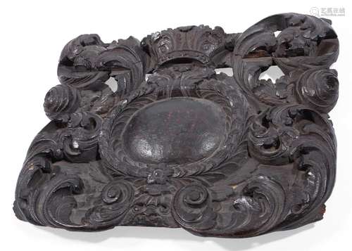 A CHARLES II CARVED OAK WALL MOUNT, CIRCA 1665